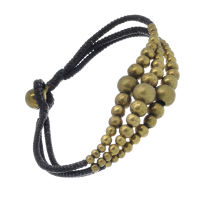 Faux leather bracelet with bronze beads
